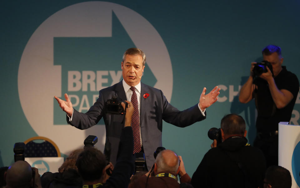 Brexit Party leader Nigel Farage speaks at a meeting to introduce his party's Parliamentary Candidates (PPC) ahead of the upcoming general election, in Westminster, London, Monday Nov. 4, 2019. Britain's election campaign heated up Sunday with Prime Minister Boris Johnson saying he would apologize to Conservatives for failing to take the U.K. out of the European Union by Oct. 31 and Brexit Party leader Nigel Farage saying he won't personally run for a seat in Parliament.  (AP Photo/Alastair Grant)