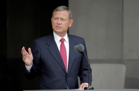 FILE PHOTO: U.S. Supreme Court Chief Justice John Roberts speaks at the dedication of the Smithsonian's National Museum of African American History and Culture in Washington, U.S., September 24, 2016. REUTERS/Joshua Roberts/File Photo