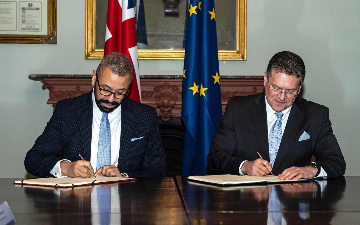 The Foreign Secretary and Maros Sefcovic sign documents - Niklas Halle'n/European Commission/AFP via Getty Images