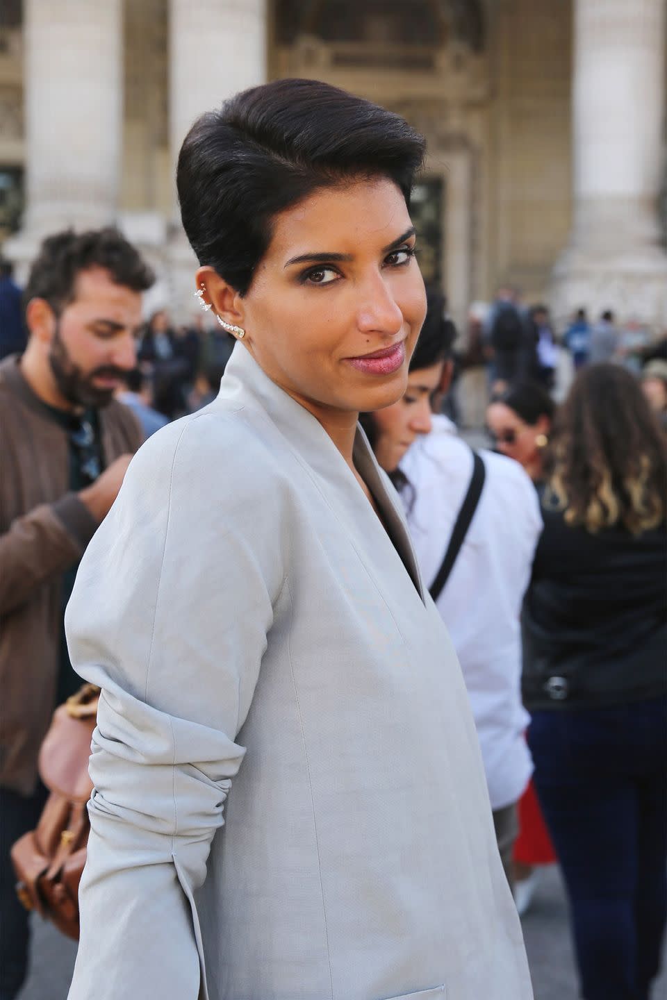 <p>Born in California, the 42-year-old Saudi princess is a fashion week veteran and the co-founder and director of D’NA, an exclusive Saudi Arabian-based boutique that has made waves across the Middle East and beyond. In 2016, Abdulaziz was named the first-ever editor-in-chief of <em>Vogue Arabia</em>, which debuted its print edition in March 2017 with <a href="https://www.buzzfeed.com/ikrd/assalamualaikum" rel="nofollow noopener" target="_blank" data-ylk="slk:Gigi Hadid wearing a hijab on the cover;elm:context_link;itc:0;sec:content-canvas" class="link ">Gigi Hadid wearing a hijab on the cover</a>. One month later, with only two editions under her belt, Abdulaziz was fired from the publication. “I refused to compromise when I felt the publisher’s approach conflicted with the values which underpin our readers and the role of the editor-in-chief in meeting those values in a truly authentic way,” she told <em><a href="https://www.businessoffashion.com/articles/news-analysis/deena-aljuhani-abdulaziz-exits-vogue-arabia" rel="nofollow noopener" target="_blank" data-ylk="slk:BoF;elm:context_link;itc:0;sec:content-canvas" class="link ">BoF</a></em>.</p>