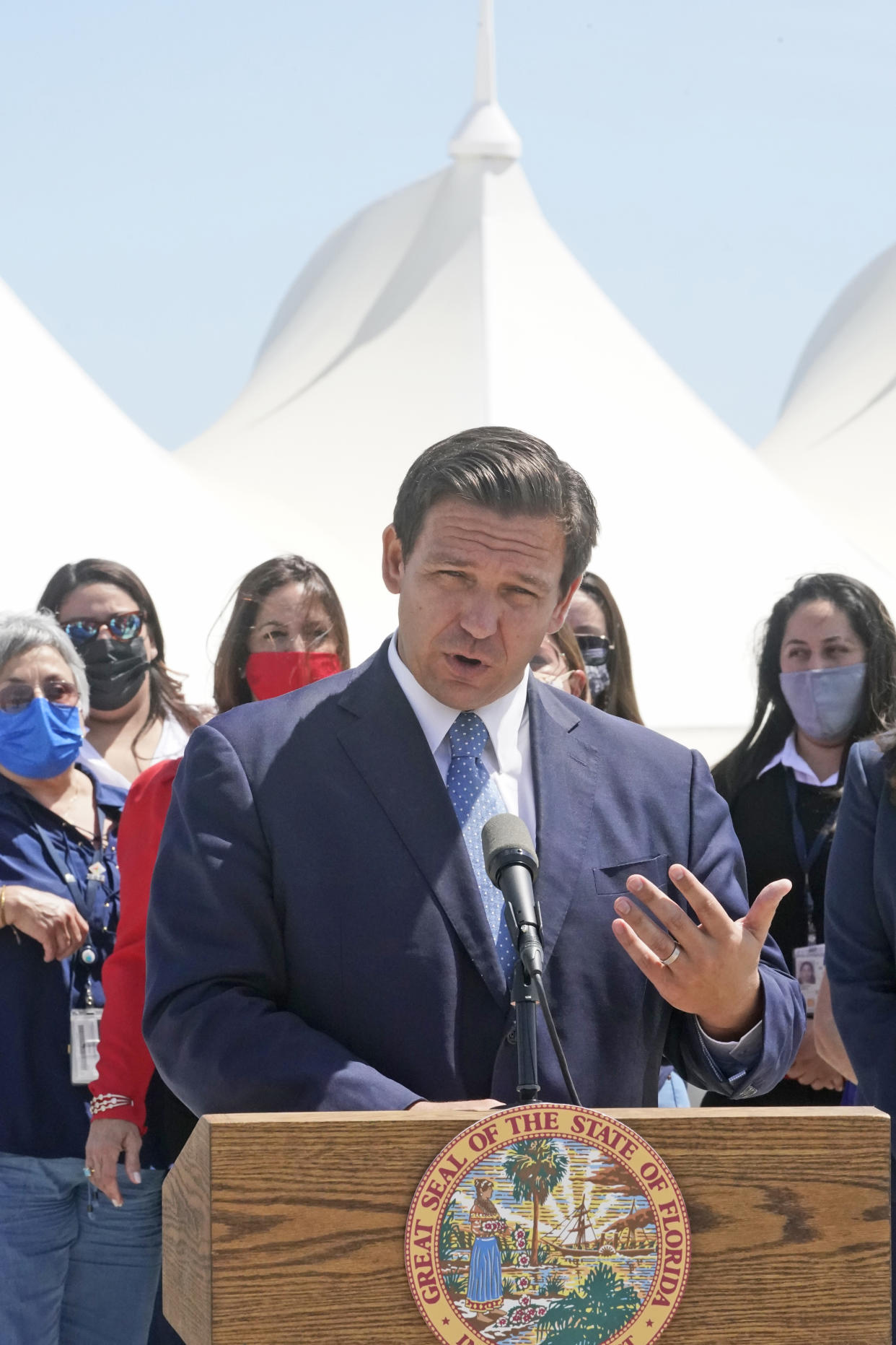 Florida Gov. Ron DeSantis speaks during a news conference, Thursday, April 8, 2021, at PortMiami in Miami. DeSantis announced a lawsuit against the federal government and the CDC demanding that cruise ships be allowed to sail. (AP Photo/Wilfredo Lee)