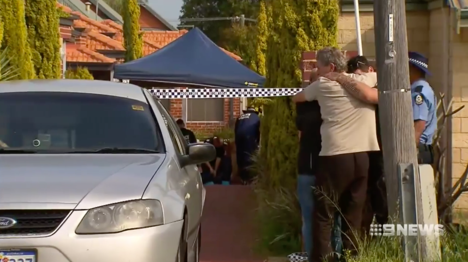 The family outside the Nollamara home on Sunday. 