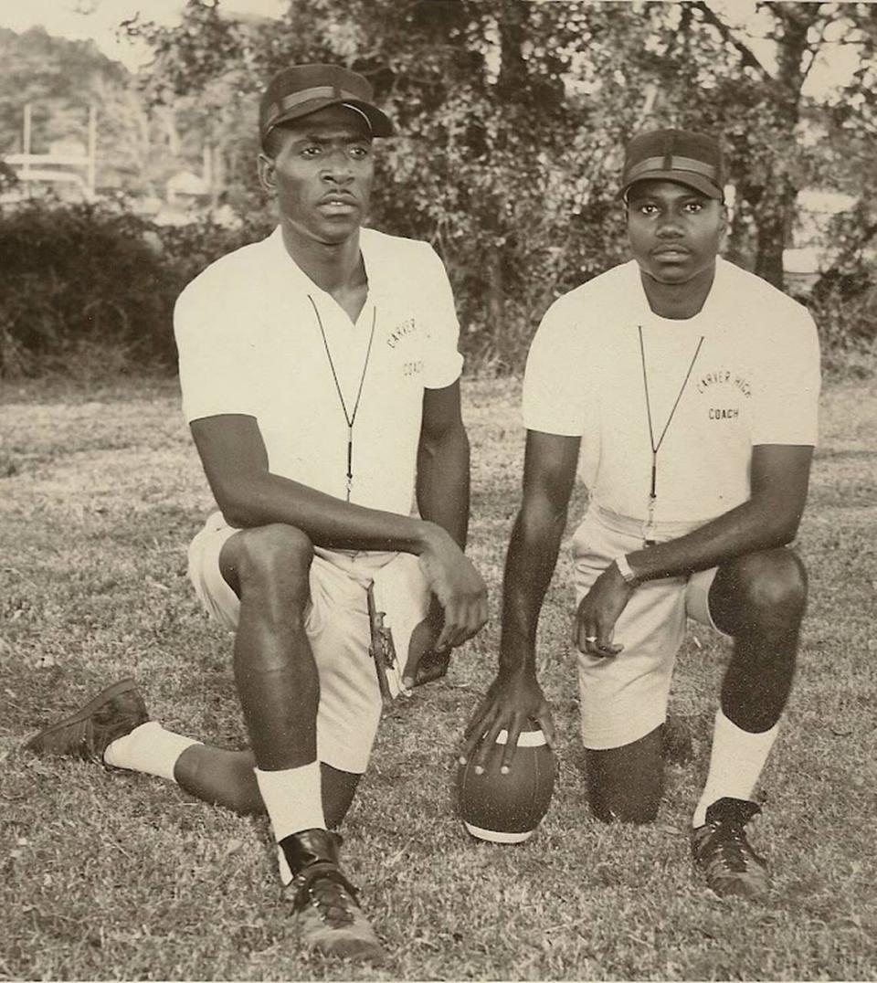 Early in his career, Moss Point Mayor Billy Knight, right, served as assistant head coach and offensive coordinator at Carver High School in Pascagoula under Coach Aaron Jones.