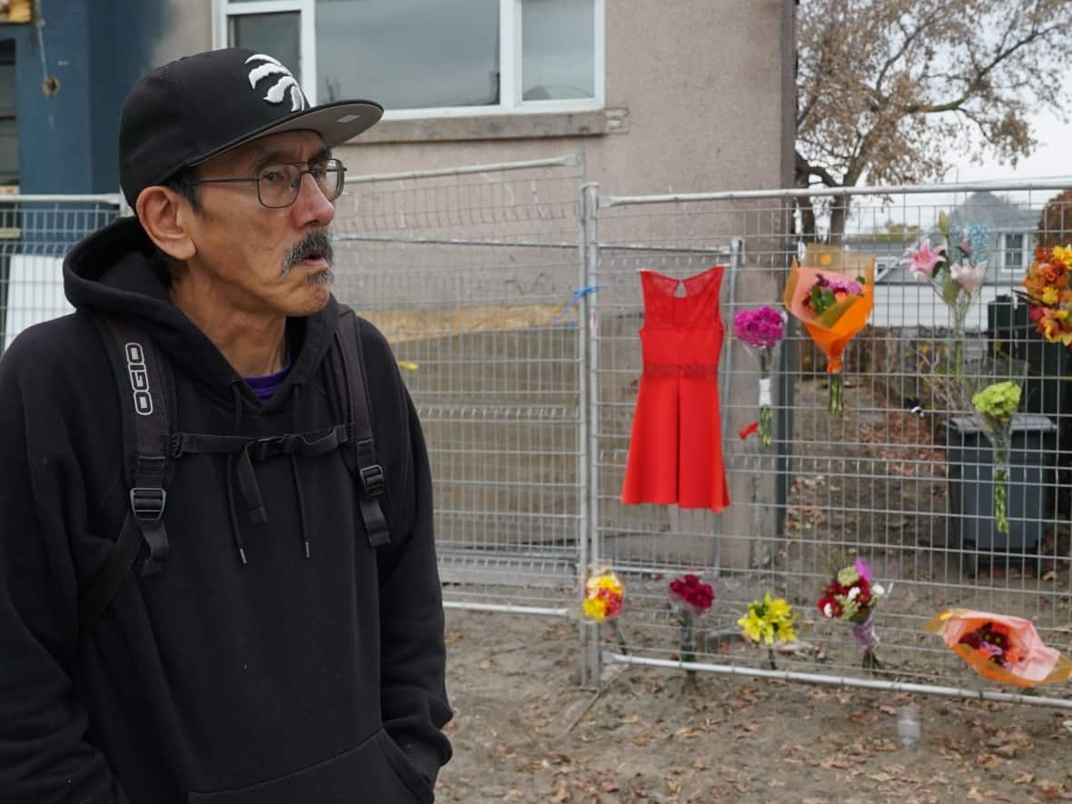 Tommy Papatsie, brother of Mary Papatsie, visited the memorial to his sister set up on Deschamps Avenue in the Ottawa community of Vanier. (Matthew Kupfer/CBC - image credit)