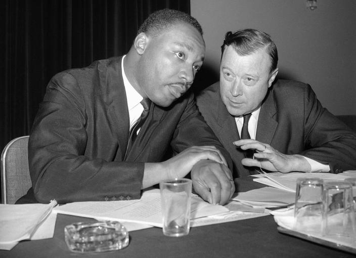 <p>The Rev. Martin Luther King, Jr., president of the Southern Christian Leadership Conference, left, and Walter Reuther, president of the United Auto Workers Union, are shown together at meeting of African American leaders at the Roosevelt Hotel in New York, July 2, 1963. (AP Photo) </p>