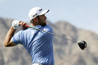 Jon Rahm, of Spain, watches his tee shot on the first hole during the second round of the Desert Classic golf tournament on the Nicklaus Tournament Course at PGA West on Friday, Jan. 18, 2019, in La Quinta, Calif. (AP Photo/Chris Carlson)