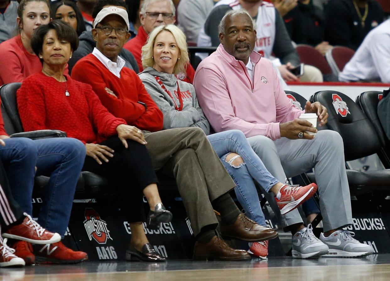 Ohio State University President, Dr. Michael V. Drake and his wife are joined by Ohio State Director of Athletes, Gene Smith, sitting court side at the exhibition game between the Ohio State Buckeyes and the Urbana Blue Knights at the Schottenstein Center in Columbus, Ohio on Sunday, Nov. 3, 2019. [Maddie Schroeder/Dispatch]