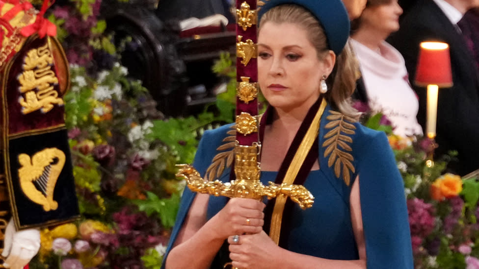 Penny Mordaunt carrying sword