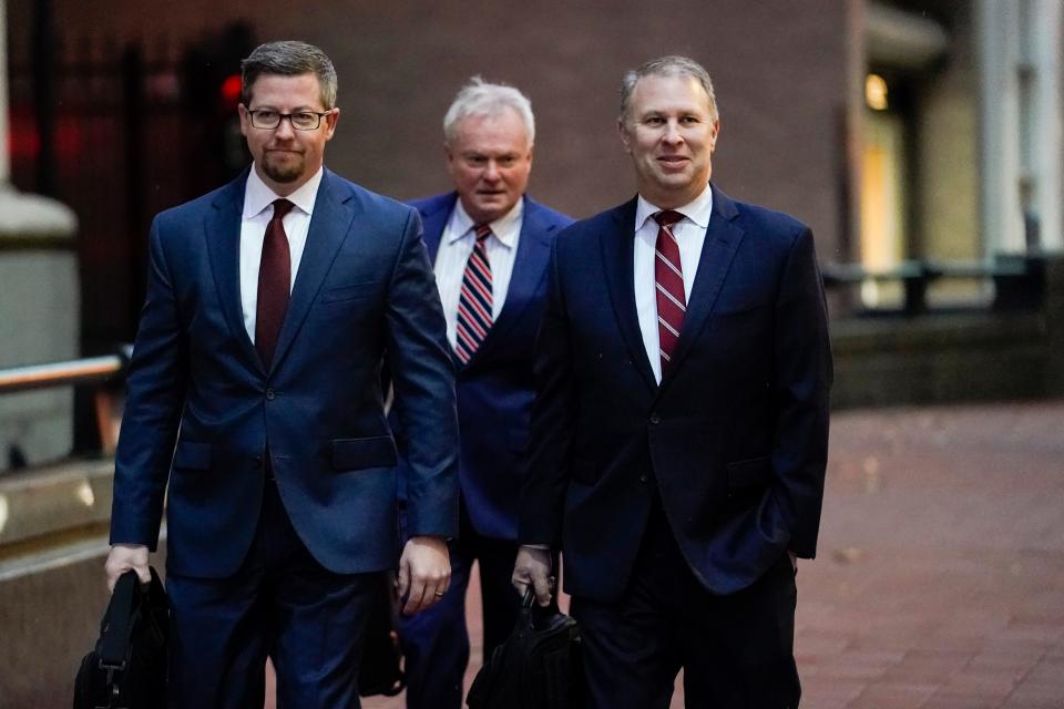 Former Ohio Republican Party chair Matt Borges, right, walks toward Potter Stewart U.S. Courthouse with his attorneys Jan. 20.