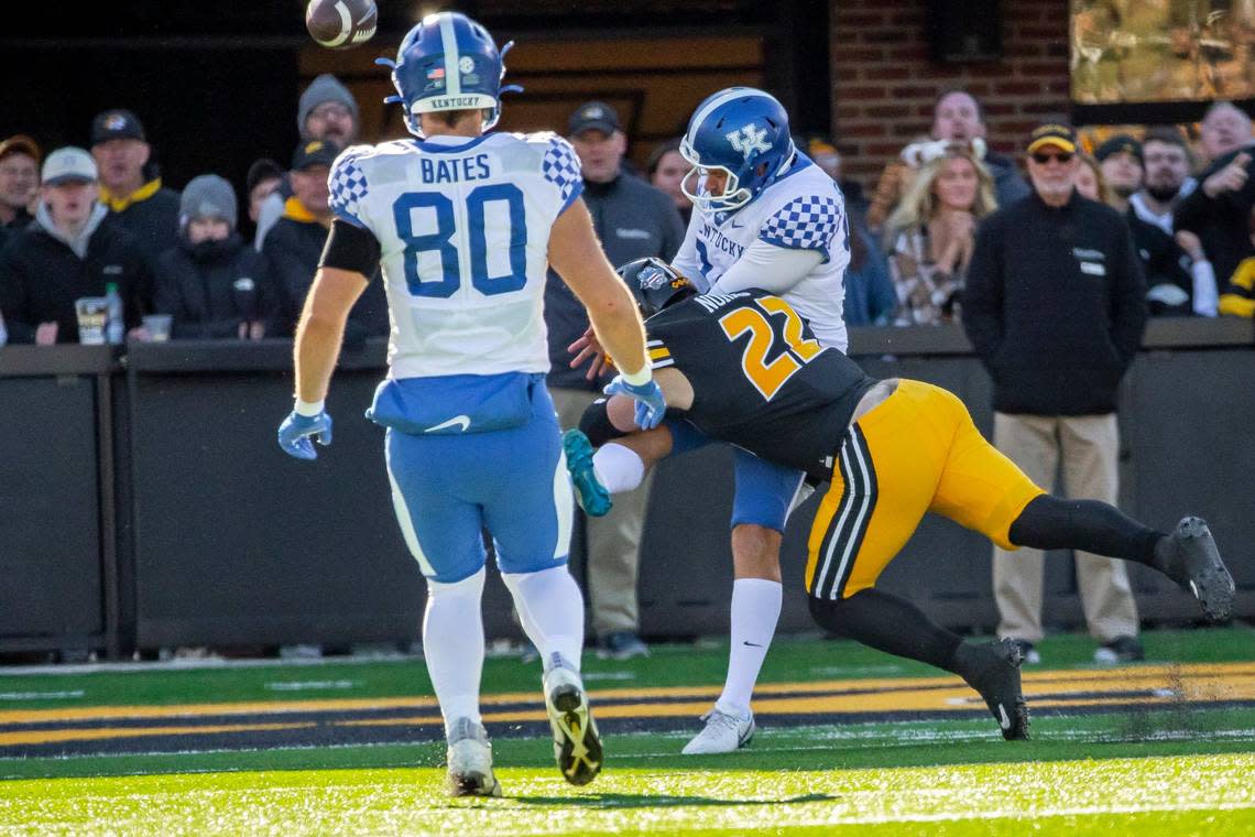 Late in UK’s 21-17 victory over Missouri, Kentucky punter Colin Goodfellow (94) was roughed by Tigers linebacker Will Norris (22), a play that helped the Wildcats preserve their victory. Ryan C. Hermens/rhermens@herald-leader.com