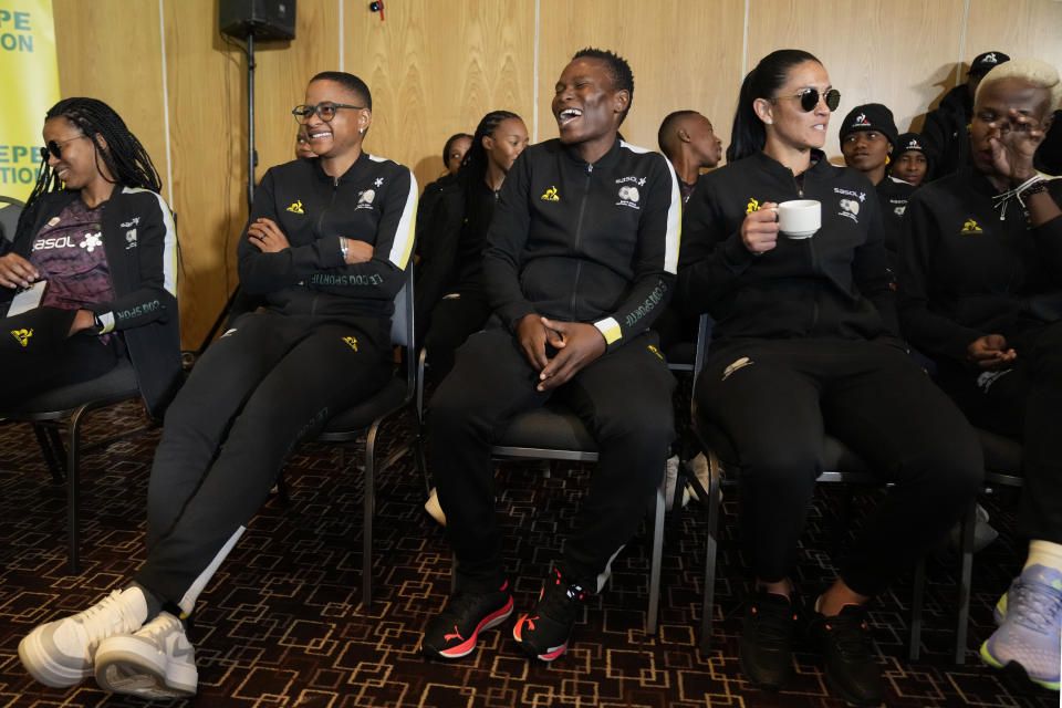 South Africa's Women's World Cup players attend a joint media briefing in Johannesburg, South Africa, Wednesday, July 5, 2023. A foundation set up by African soccer president and billionaire businessman Patrice Motsepe stepped in Wednesday to resolve a pay dispute between South Africa's Women's World Cup players and their national association, ensuring they will get on a plane and head to the tournament in Australia and New Zealand. (AP Photo/Themba Hadebe)