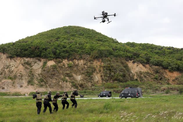 ZHOUSHAN, CHINA - APRIL 22, 2021 - Police patrol commandos use a drone to search the suspect area in Zhoushan, Zhejiang province, China, April 22, 2021. (Photo credit should read Costfoto/Barcroft Media via Getty Images) (Photo: Barcroft Media via Getty Images)