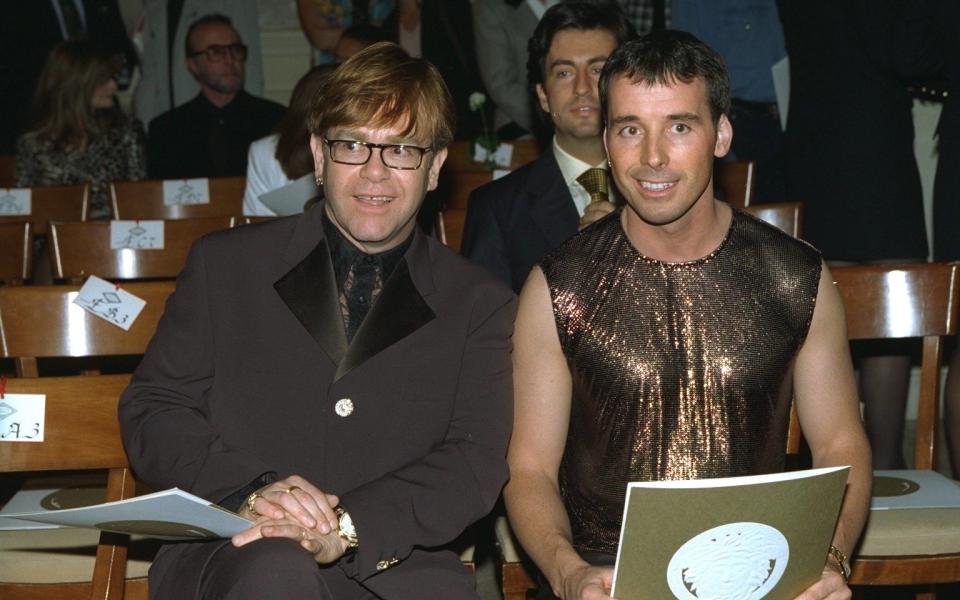 With David Furnish at the Autumn/winter 96/97 Versace Haute Couture show