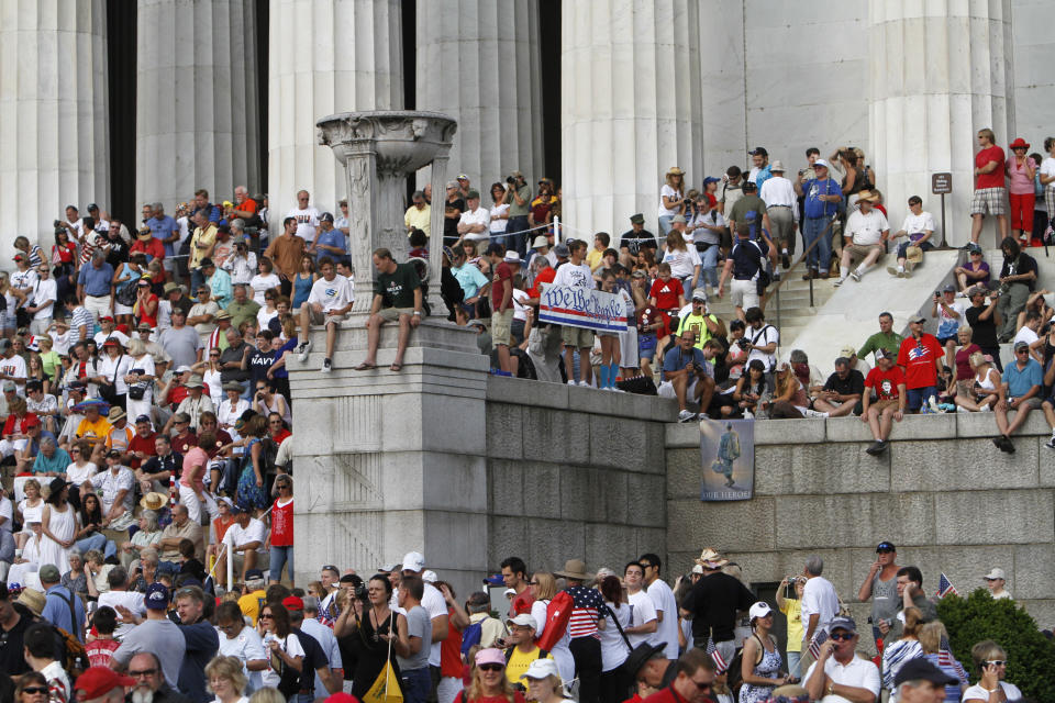 FILE - Crowds fill the steps of the Lincoln Memorial while attending the "Restoring Honor" rally, organized by Glenn Beck, near the Lincoln Memorial in Washington, on Saturday, Aug. 28, 2010. (AP Photo/Jacquelyn Martin, File)