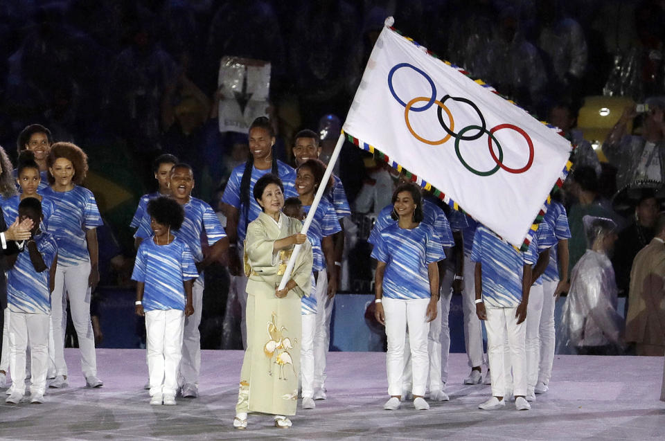 <p>Tokyo governor Yuriko Koike waves the Olympic flag during the closing ceremony in the Maracana stadium at the 2016 Summer Olympics in Rio de Janeiro, Brazil, Sunday, Aug. 21, 2016. (AP Photo/Natacha Pisarenko) </p>