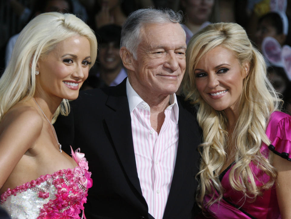 Holly Madison and Bridget Marquardt, here with Hugh Hefner together in 2008, open up about their relationship with the Playboy mogul.