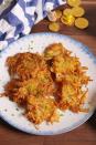 <p>These ultra-crispy potato pancakes are a Hanukkah miracle.</p><p>Get the recipe from <a href="https://www.delish.com/cooking/recipe-ideas/recipes/a50756/best-latkes-recipe/" rel="nofollow noopener" target="_blank" data-ylk="slk:Delish;elm:context_link;itc:0;sec:content-canvas" class="link ">Delish</a>.</p>