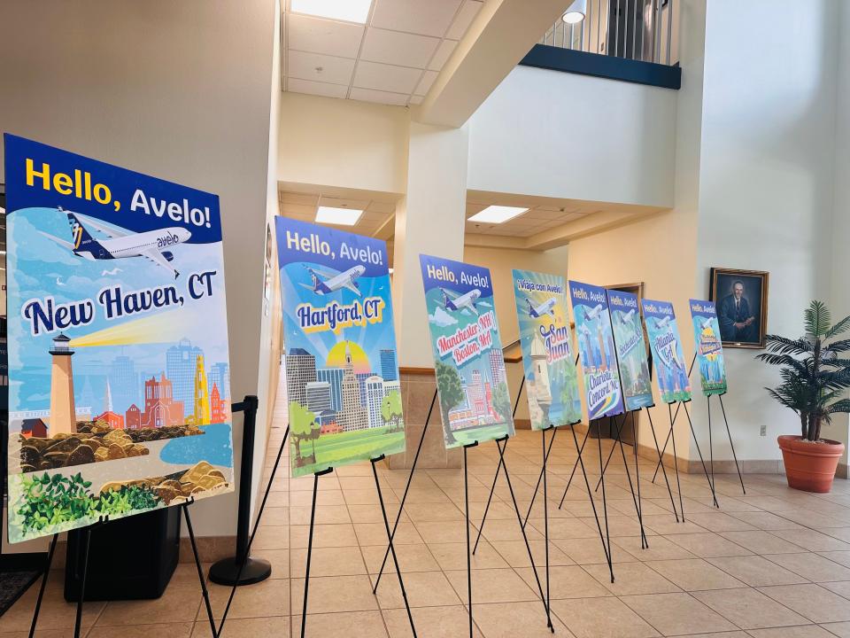 Eight signs lined the entrance of Lakeland Linder International Airport announcing Avelo's flight destinations, starting with its first launch, Tweed-New Haven Airport in Connecticut, followed by the seven new cities starting this fall.