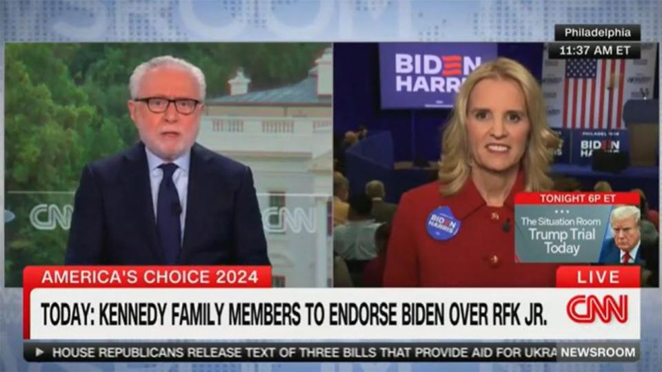 split: CNN's Wolf Blitzer, left; Kerry Kennedy, right