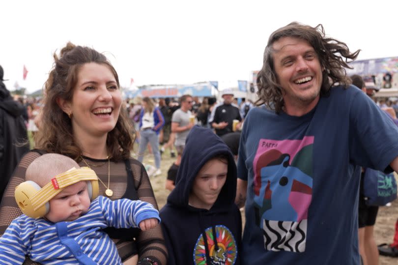 (left to right) Baby Finlay, mother Rosie, sister Sofia and father Tom at Glastonbury Festival.