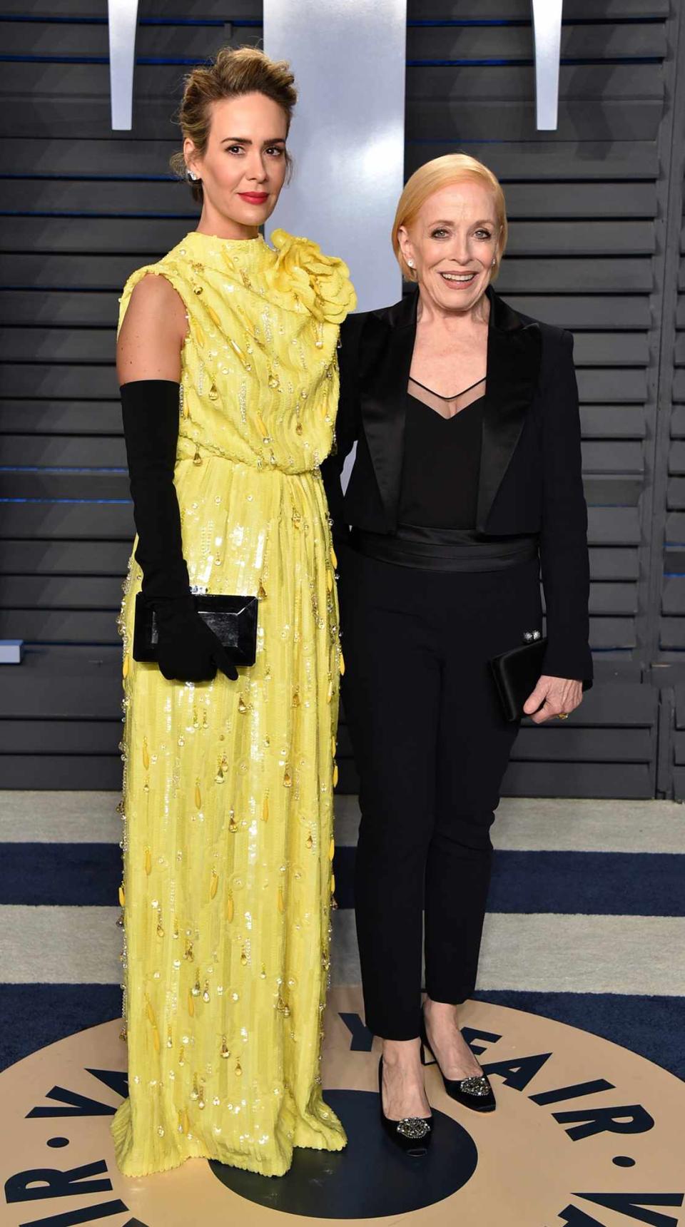 Sarah Paulson (L) and Holland Taylor attend the 2018 Vanity Fair Oscar Party hosted by Radhika Jones at Wallis Annenberg Center for the Performing Arts on March 4, 2018 in Beverly Hills, California