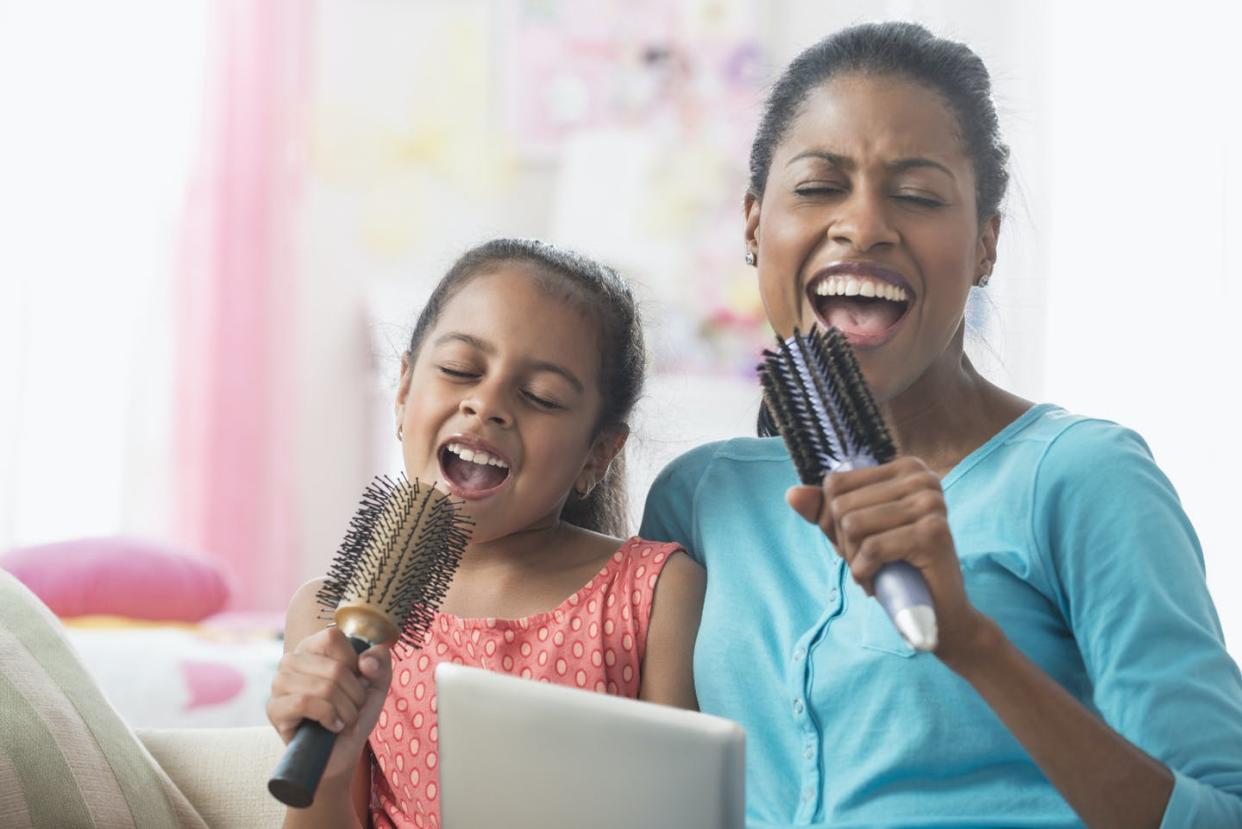 <span class="caption">Parents can sing their way through the day.</span> <span class="attribution"><a class="link " href="https://www.gettyimages.com/detail/photo/hispanic-mother-and-daughter-singing-with-royalty-free-image/554372395" rel="nofollow noopener" target="_blank" data-ylk="slk:Jose Luis Pelaez Inc./Getty Images;elm:context_link;itc:0;sec:content-canvas">Jose Luis Pelaez Inc./Getty Images</a></span>