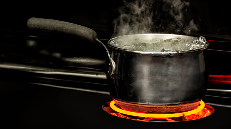 Water boiling on electric stove