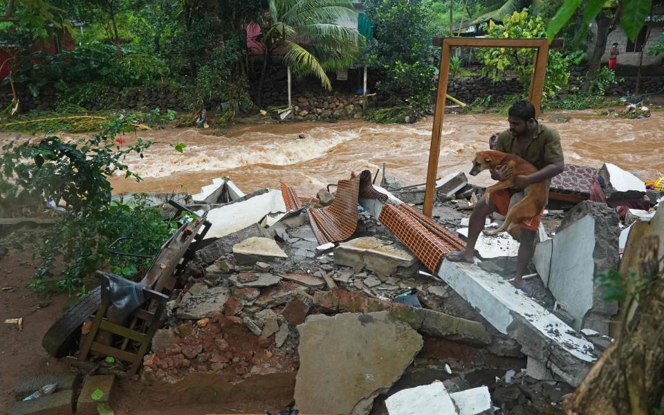 Landslides and flooding kill at least 25 in southwest India - APPU S. NARAYANAN /AFP