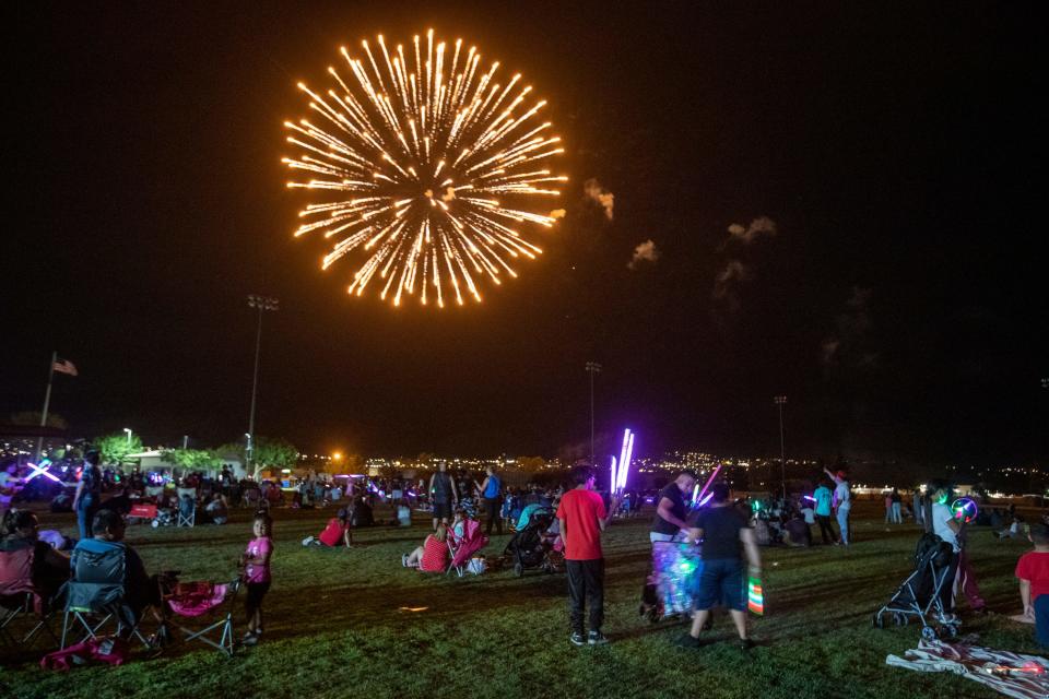 People gather at Mission Springs Park to watch the fireworks show in Desert Hot Springs, Calif., on July 2, 2021. 