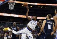 Dec 1, 2017; Orlando, FL, USA; Golden State Warriors forward Kevin Durant (35) shoots in the act of getting fouled and shoots and one against the Orlando Magic during the second quarter at Amway Center. Mandatory Credit: Kim Klement-USA TODAY Sports