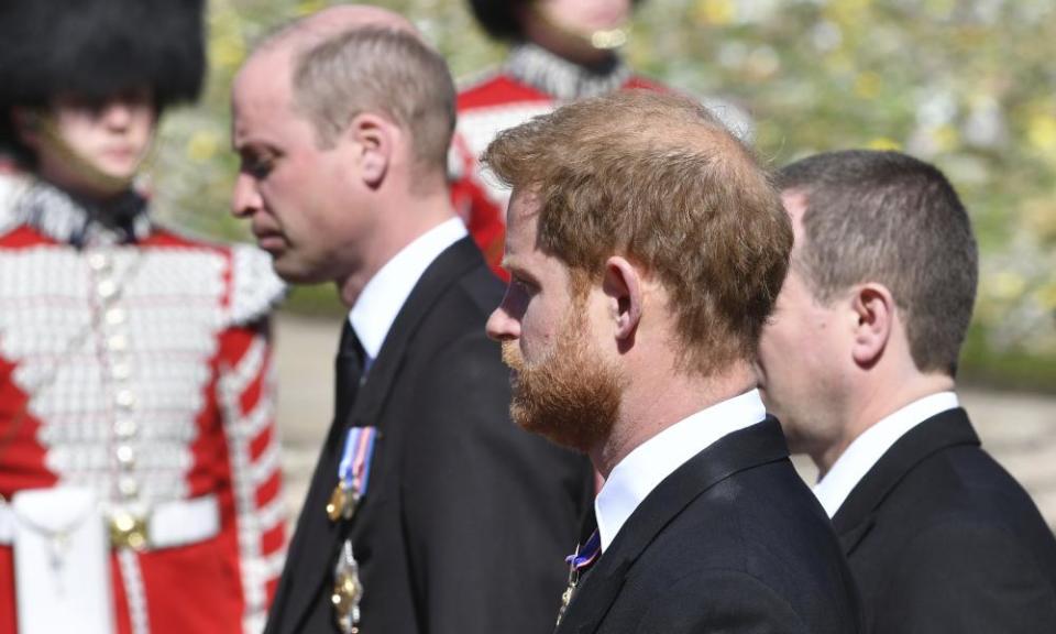 William and Harry walking behind the coffin