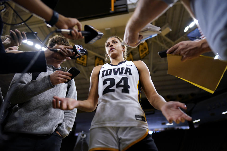 Iowa guard Gabbie Marshall speaks to reporters during Iowa's NCAA college basketball media day, Wednesday, Oct. 4, 2023, in Iowa City, Iowa. (AP Photo/Charlie Neibergall)