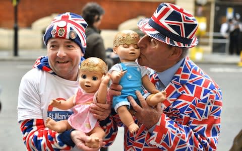 John Loughrey (left) and Terry Hutt hold dolls outside the Lindo Wing  - Credit: Dominic Lipinski /PA