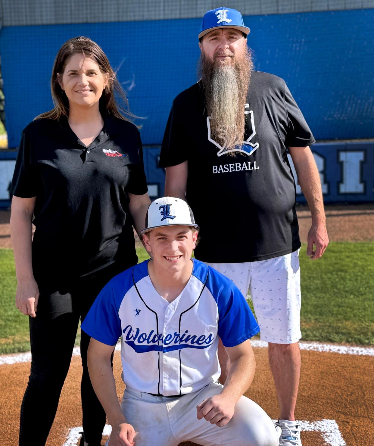 La Vergne senior baseball player Ashton Keck (front) is shown with his adoptive parents, Elizabeth and T.J. Townsend.