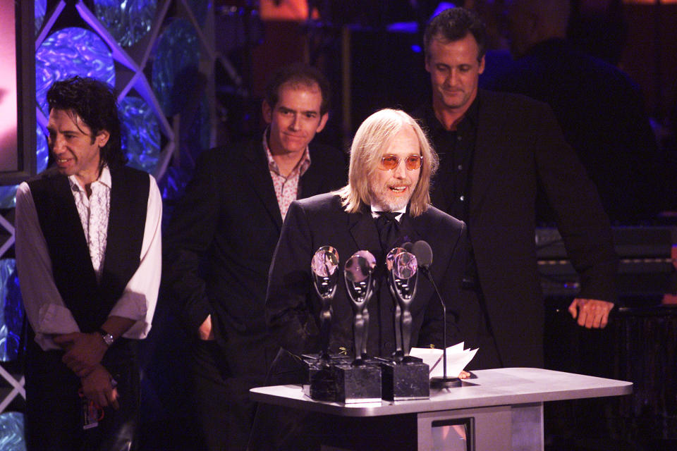 <p>Tom Petty and the Heartbreakers at the 17th Annual Rock & Roll Hall of Fame Induction Ceremony at the Waldorf Astoria in New York City, March 18, 2002. (Photo: Frank Micelotta/Getty Images) </p>