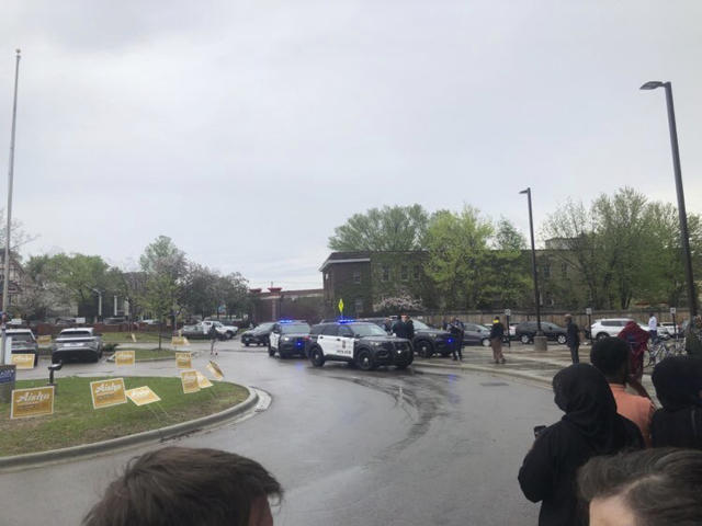 This photo provided by Bridget Siljander shows police as they arrive at the Ella Baker Center in Minneapolis, Saturday, May 13, 2023, after a brawl broke out over nominations for a Minneapolis City Council seat. At least two people were injured during the confrontation inside. (Bridget Siljander via AP)