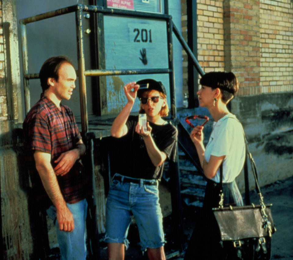 Three young people standing together