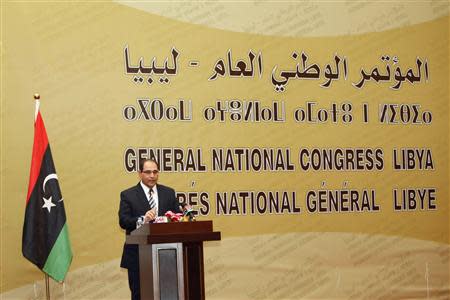 Nuri al-Abbar, head of the High National Elections Commission, speaks during a ceremony in Tripoli January 30, 2014. REUTERS/Ismail Zitouny