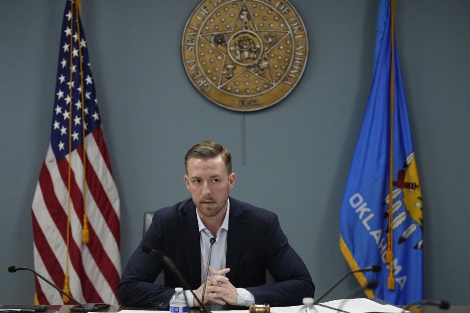 Superintendent of Public Instruction Ryan Walters presides over a state Board of Education meeting in April 2023 in Oklahoma City. <a href="https://newsroom.ap.org/detail/OklahomaEducationBoardWalters/394b882de0be4931b36d0b137b005f87/photo?Query=walters%20oklahoma&mediaType=photo&sortBy=creationdatetime:desc&dateRange=Anytime&totalCount=74&currentItemNo=10" rel="nofollow noopener" target="_blank" data-ylk="slk:AP Photo/Sue Ogrocki;elm:context_link;itc:0;sec:content-canvas" class="link ">AP Photo/Sue Ogrocki</a>