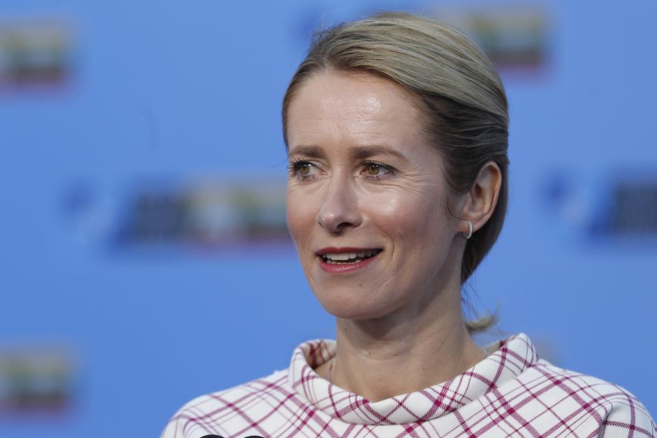 FILE - Estonia's Prime Minister Kaja Kallas speaks with the media as she arrives for a NATO summit in Vilnius, Lithuania, Wednesday, July 12, 2023. Estonia's prime minister has been put on a wanted list in Russia because of her efforts to remove Soviet-era World War II monuments in the Baltic nation, officials said Tuesday as tensions between Russia and the West soar amid the war in Ukraine. (AP Photo/Mindaugas Kulbis, File)