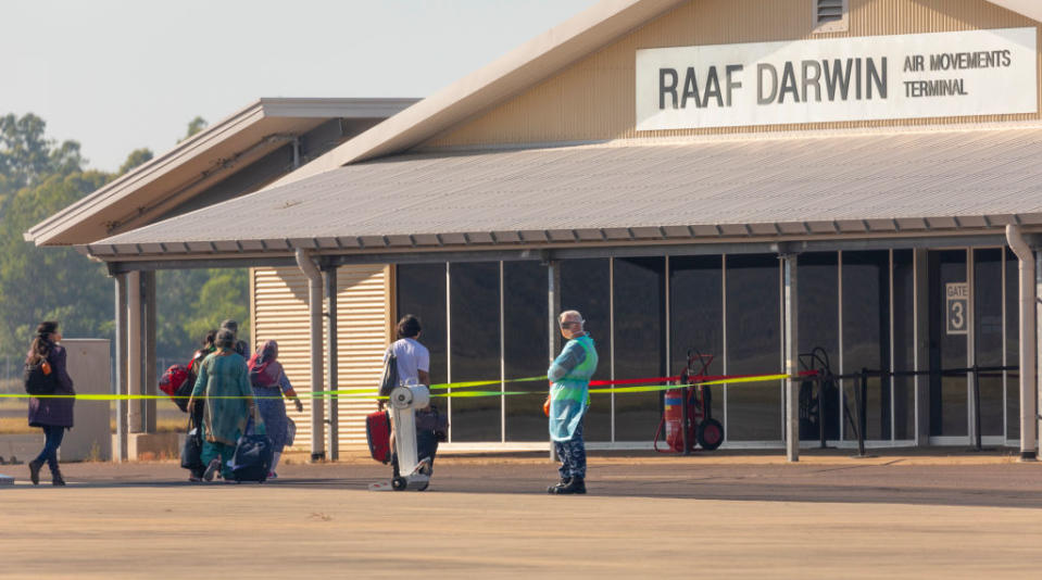 In this handout provided by the Australian Department of Defence, passengers from flight QF112 are transported to the Howard Springs Quarantine Facility after arriving at RAAF Base Darwin in Darwin, Australia on May 15, 2021.<span class="copyright">LAC Stewart Gould—Australian Department of Defence/Getty Images</span>