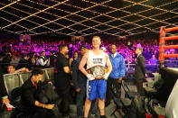 <p>Steve Merslich (red) shows off his championship belt after defeating Francis Torres (blue) in the Baseball Team Grudge match in the NYPD Boxing Championships at the Hulu Theater at Madison Square Garden on March 15, 2018. (Gordon Donovan/Yahoo News) </p>