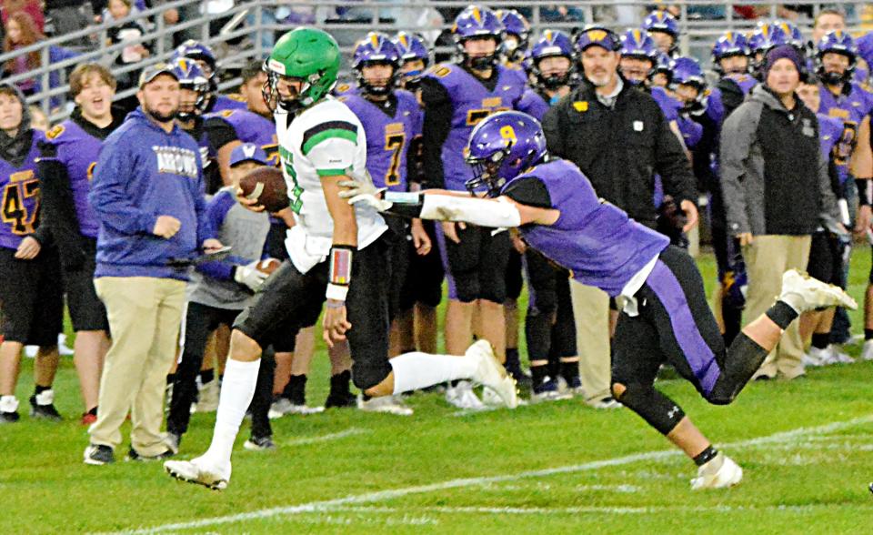 Watertown's Austin Johnson (9) pushes Pierre's Lincoln Kienholz out of bounds during their Eastern South Dakota Conference football game on Friday, Sept. 23, 2022 at Watertown Stadium. Pierre won 47-13.