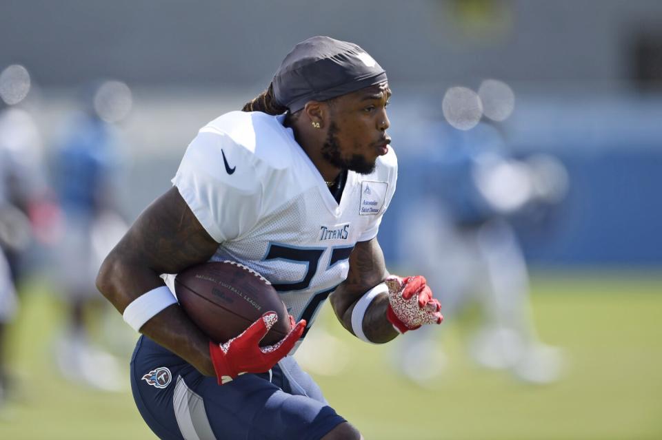 Tennessee Titans running back Derrick Henry runs a drill.