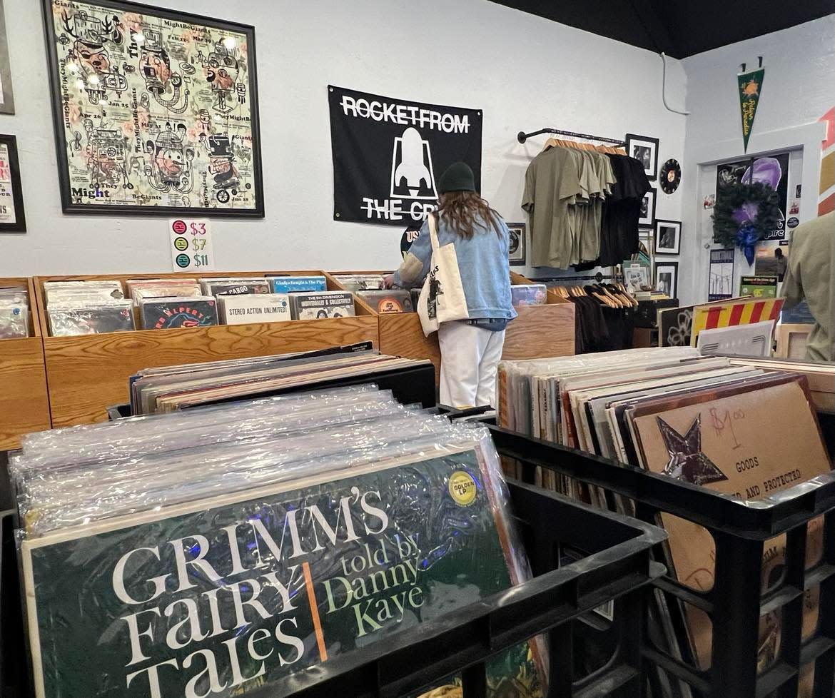 Erie St Vinyl in downtown Massillon attracts shoppers of different age groups who enjoy the nostalgic experience of collecting and listening to LPs.