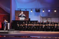 Heads of State listen to Auschwitz survivor Marian Turski, at the lectern, deliver a speech during a ceremony at the Auschwitz-Birkenau Nazi death camp in Oswiecim, Poland, Monday, Jan. 27, 2020. Heads of State and survivors of the Auschwitz-Birkenau death camp gathered Monday for commemorations marking the 75th anniversary of the Soviet army's liberation of the camp, using the testimony of survivors to warn about the signs of rising anti-Semitism and hatred in the world today. (AP Photo/Markus Schreiber)