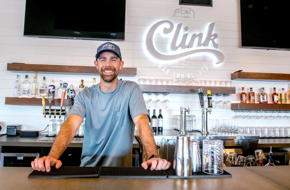 Owner Sam Heppard stands behind the bar at his new Peoria Heights tavern Clink Bar and Events above Brienzo's Pizza in Heritage Square. Clink is planning to open for business on Oct. 14.