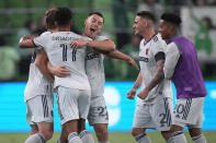 St Louis City SC defender Kyle Heibert (22) hugs teammate Nicholas Gioacchini (11) as they celebrate their win over Austin FC in an MLS soccer match in Austin, Texas, Saturday, Feb. 25, 2023. (AP Photo/Eric Gay)