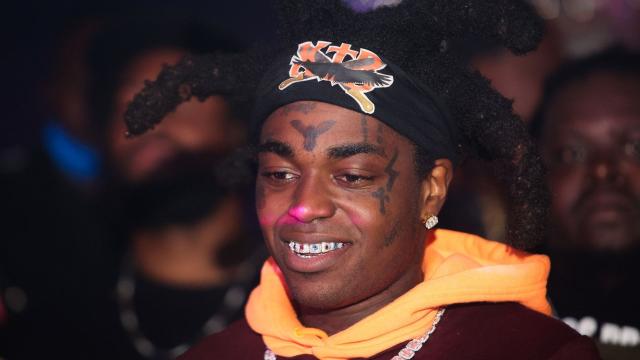 Kodak Black Wears $10,000 Pendant of Trump Smoking Joint, Wishes