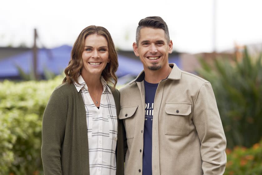 Pastor Andy Wood and his wife, Stacie Wood, stand for a portrait on Sunday, Oct. 16, 2022, at Saddleback Church